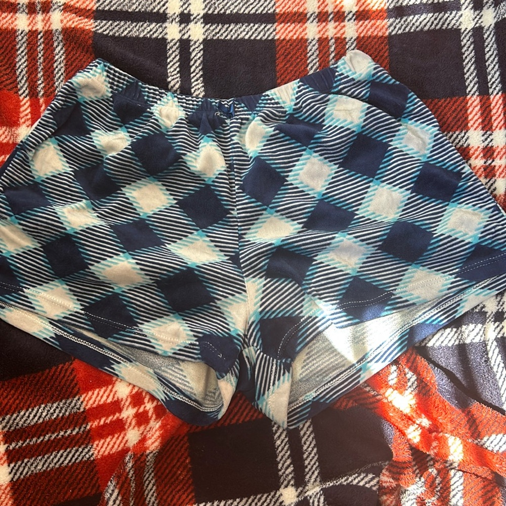Blue and white pajama pants in a size medium never worn